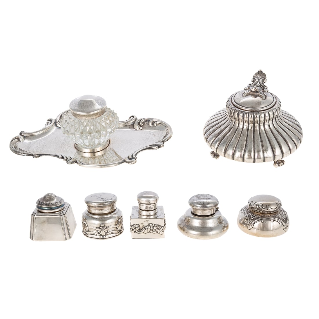 Seven American Sterling Inkwells Including Tiffany: Including: 1) Tiffany & Co., 1892-1902, pattern# 11596, round with scrolling decoration, affixed glass liner, 1 7/8 in. H; 2) Gorham, 1895 date mark, model# 805, monogrammed cover and glass liner, 1