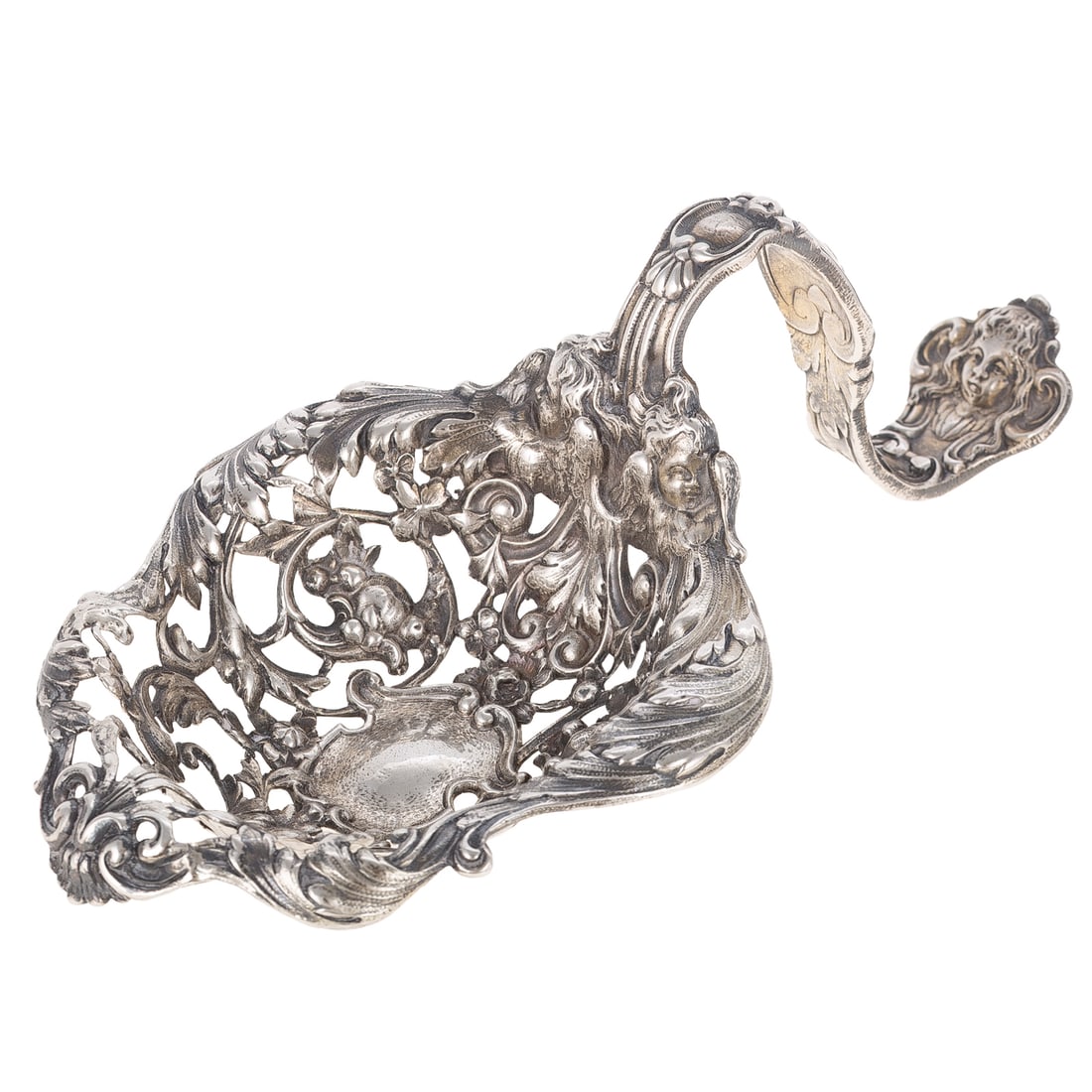 Gorham Sterling Bonbonniere: 1900 date mark, model# A291, ornately modeled, the reticulated body featuring scrolling acanthus, centered with a shield, with masque terminals, 8 in. L, 8.3 ozt.