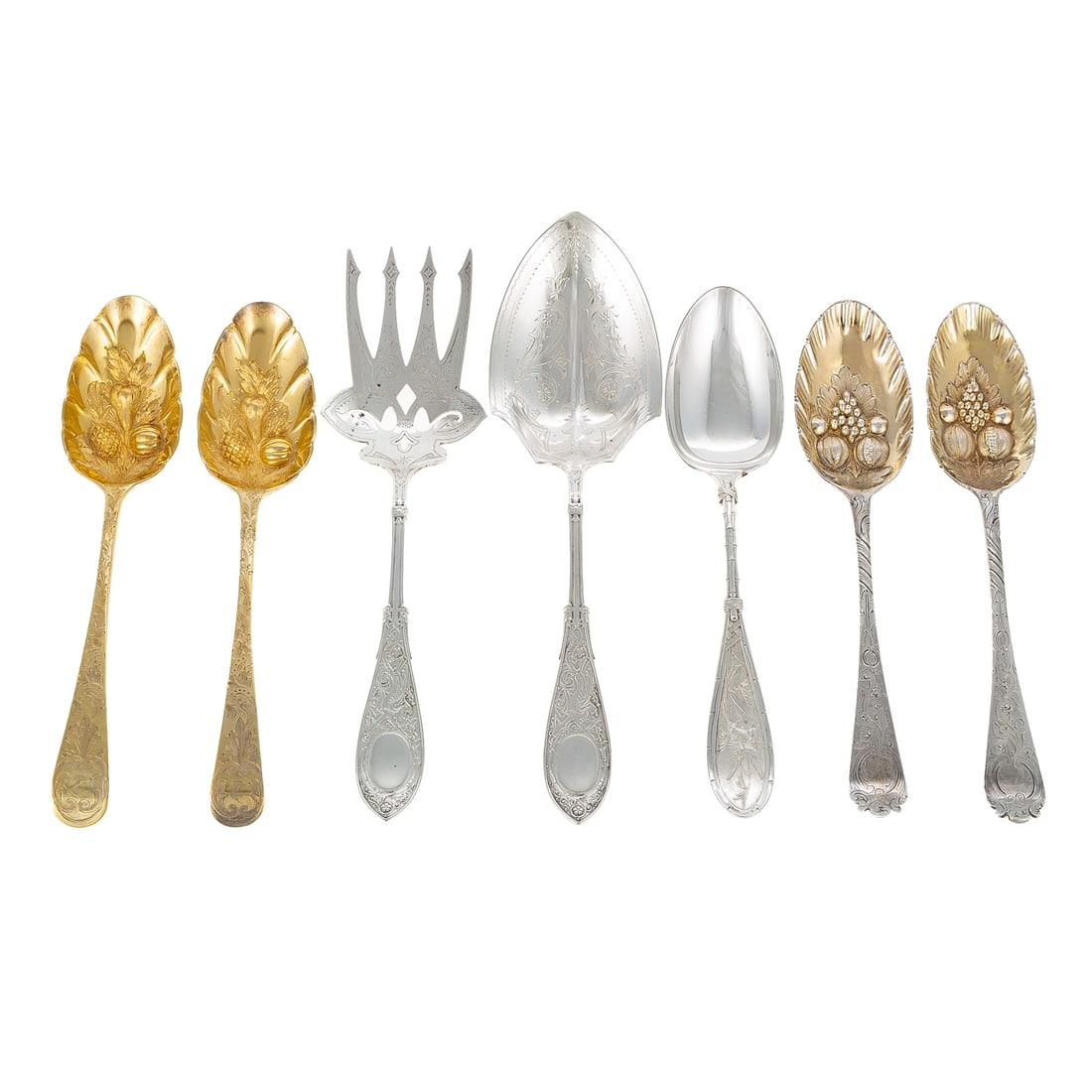 Seven Pieces English & American Sterling Flatware: Including: four George III silver spoons, each by a different maker, including one by Hester Bateman, London, 1777, with later berry decoration, two with a chased armorial device on the terminal and a