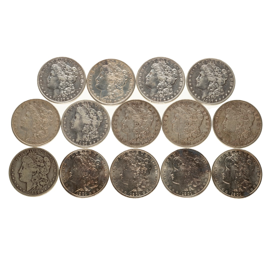 14 Morgan Silver Dollars: 1884 Fine, 1884 VF/XF. 1886-O VG, 1888 Fine, 1888 VF, 1897 XF, lightly polished, 1897 XF, 2-1897-O Fine, Cleaned, 1897-O VF, cleaned, 1901-O Lustrous XF45 with toned obverse, 1901-O Lustrous XF45