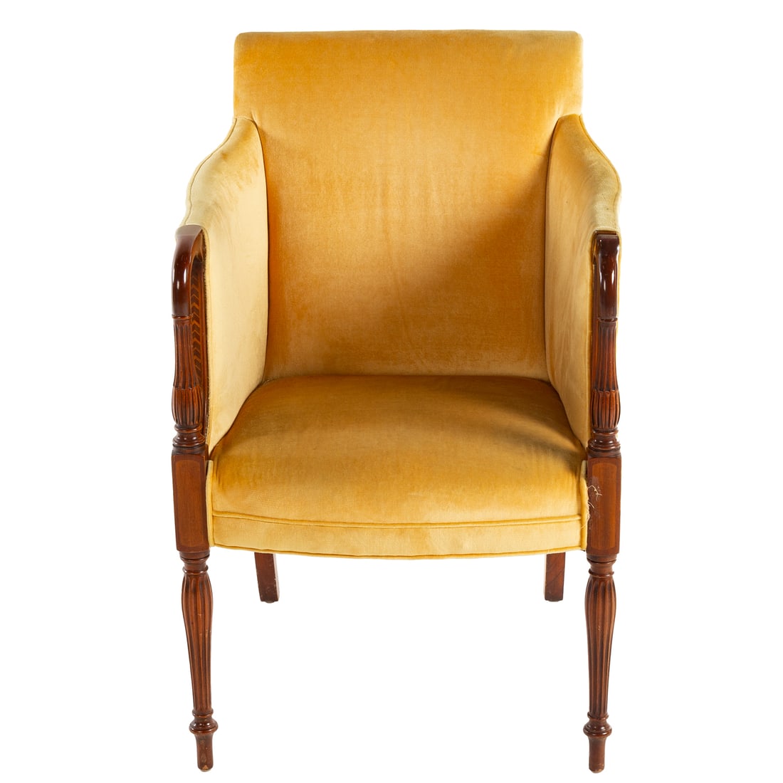 Southwood Inlaid Mahogany Library Armchair: Fully velour upholstered back, seat and sides, carved and inlaid arms and arm supports extending into bulging fluted legs, 36 1/2 in. H, 23 in. W, 23 1/2 in. D Provenance: From the estate of a