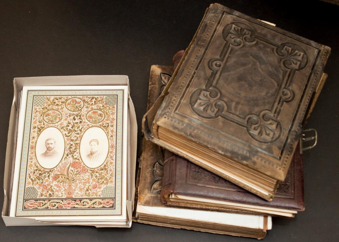 [Photography] Three Victorian albums: in full leather bindings, with clasps, including "A Dream of Fair Women" album; contents include c de v's and cabinet cards of upper middle class English family members, 1860s-'90s