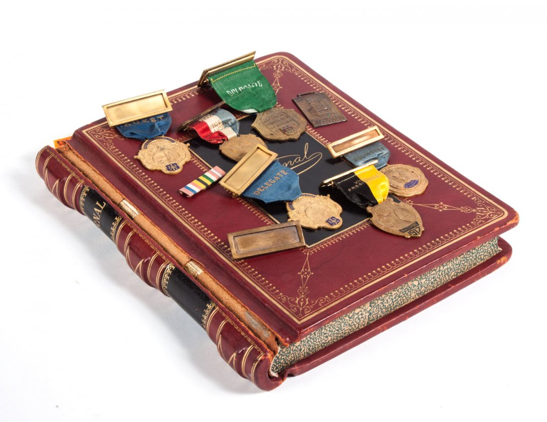 Seven Investment Bankers' Assoc. convention badges: 1917-1926; enamelled gilt bronze, most with original silk ribbons; together with a ledger associated with the Baker Watts & Co., investment bankers, apparently detailing living expenses of amily membe