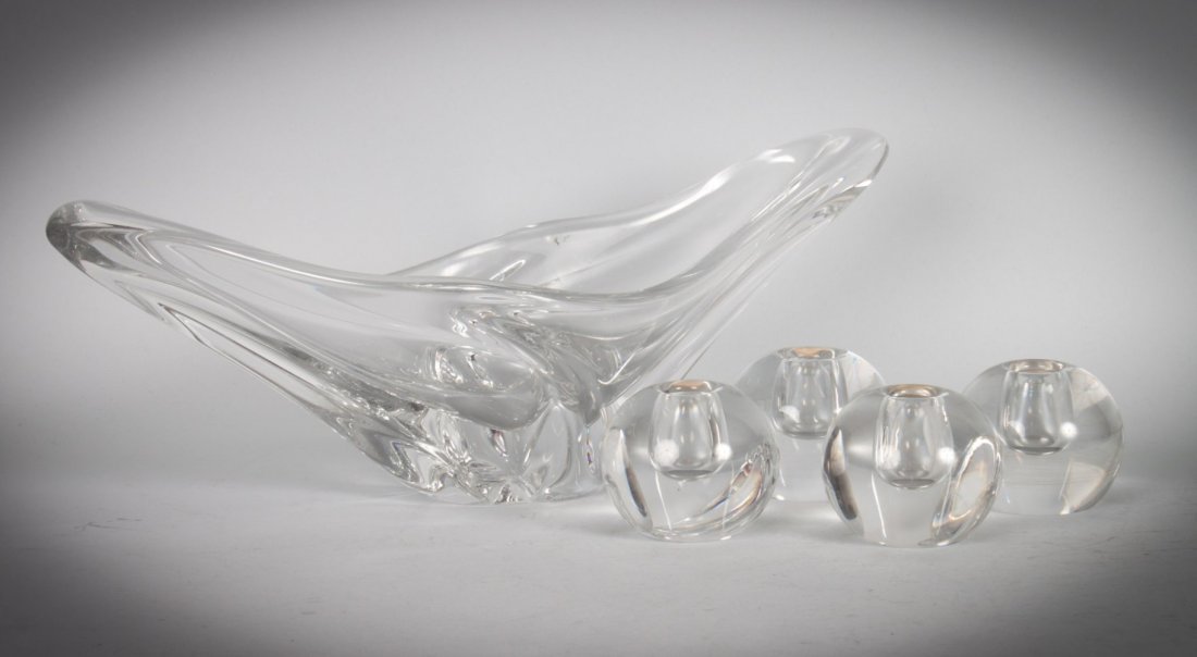 Five Orrefors and Daum France glass articles: comprising: four Orrefors spherical candleholders, 2 1/2 in. Diam., and a Daum France free-form vase, 6 in. H., 16 in. L.