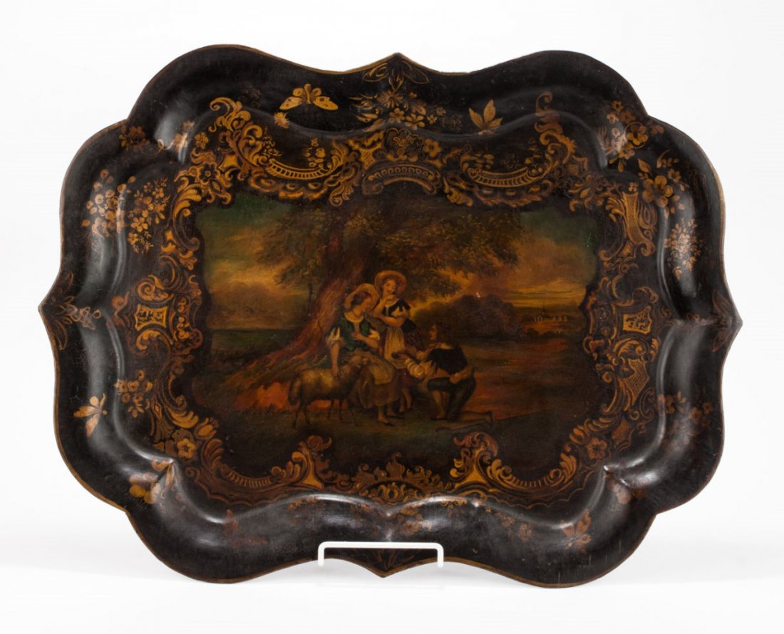 Victorian toleware tray: second half-19th century; gilt, floral, and scroll border, central decoration of two shepherdesses and shepherd in landscape, 29 in. L., 21 in. W.