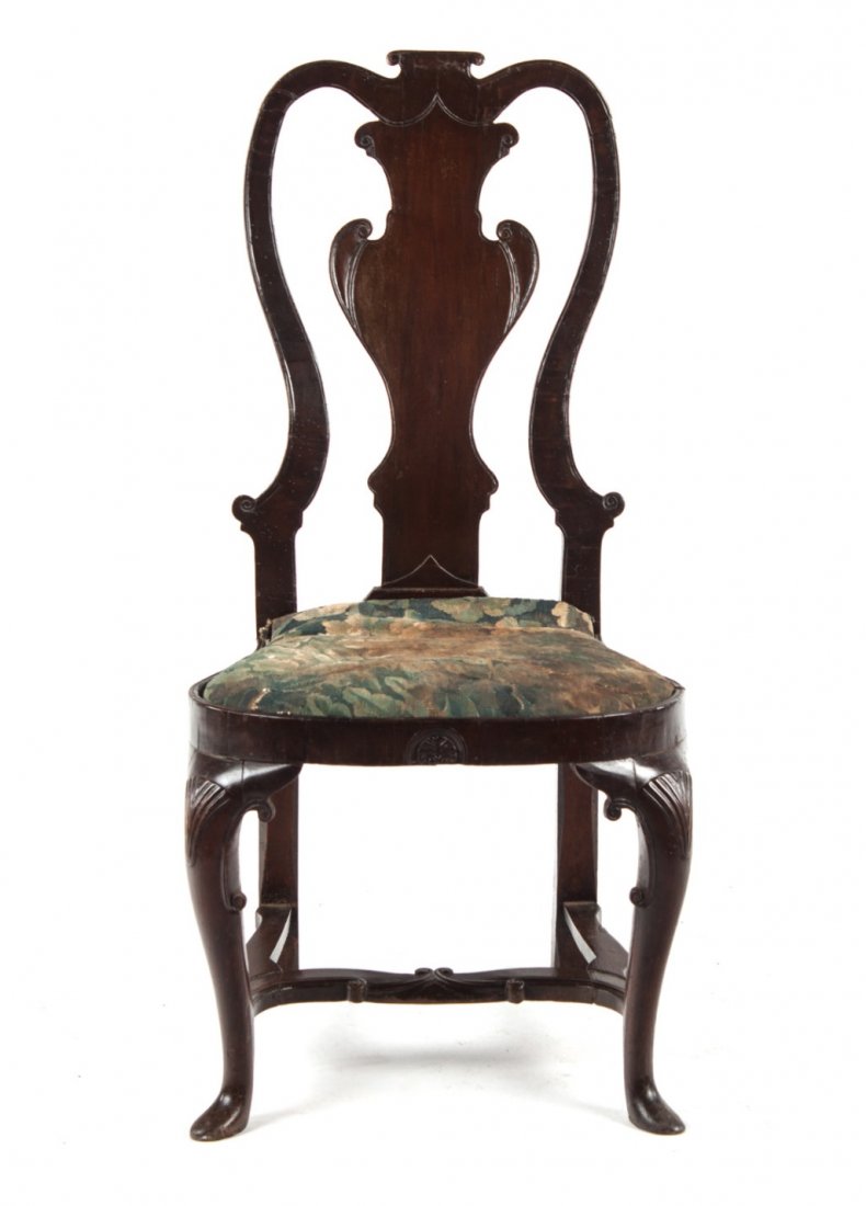 George II mahogany inlaid oak side chair: circa 1750; vasiform back, cabriole legs connected by shell-carved knees connected by shaped front stretchers, needlepoint upholstered slip seat, stretcher base, 40 in. H., 20 in. W.