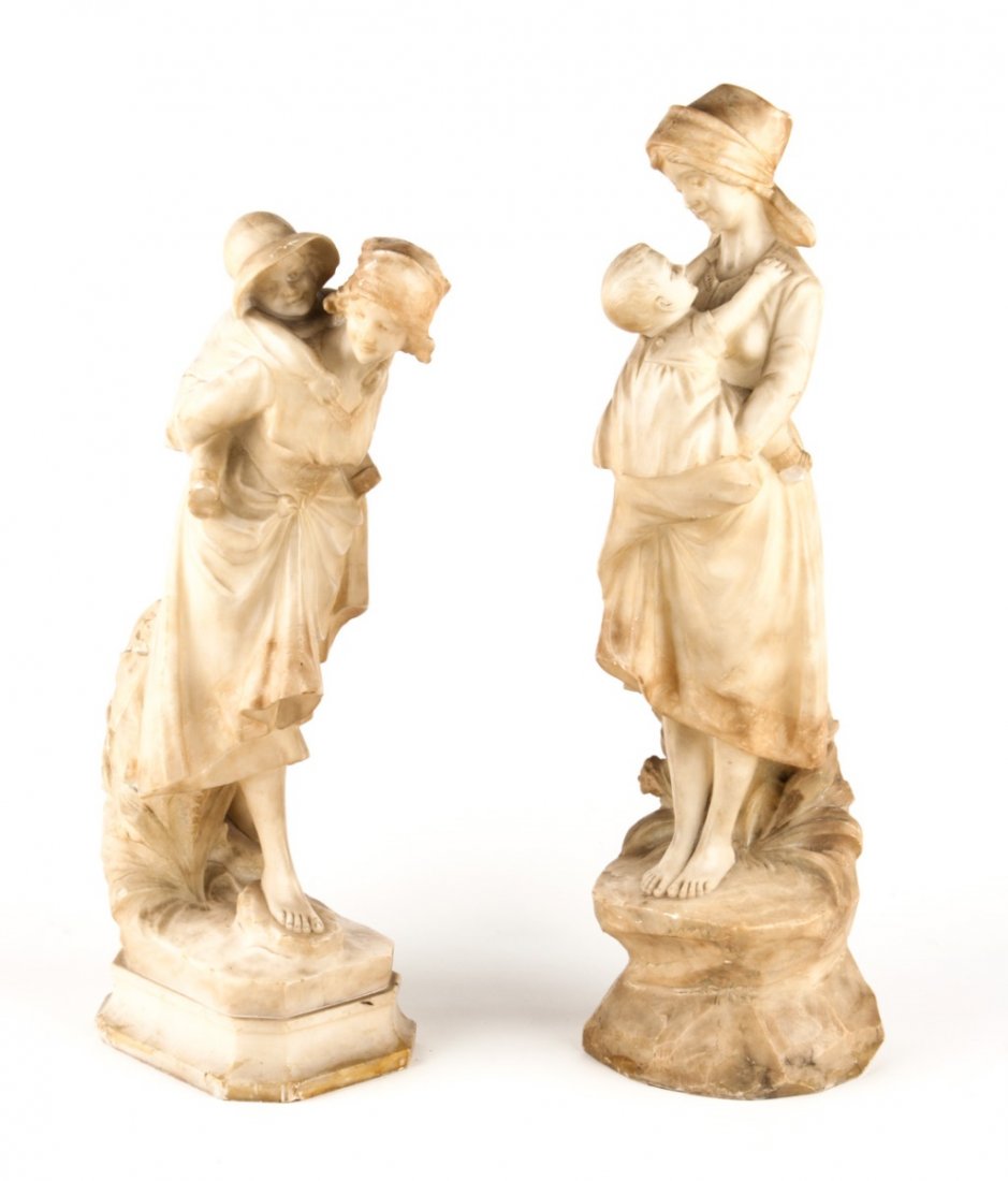 Pair of Italian carved alabaster figures: late 19th century; each modeled as peasant woman carrying a child, 20 in. H. of tallest