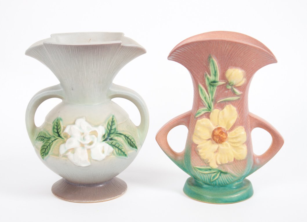 Two Roseville art pottery double-handled vases: circa 1930; Gardenia Grey pattern, 684-8, 8 in. H.; Peony pattern, 62-8, 8 in. H.