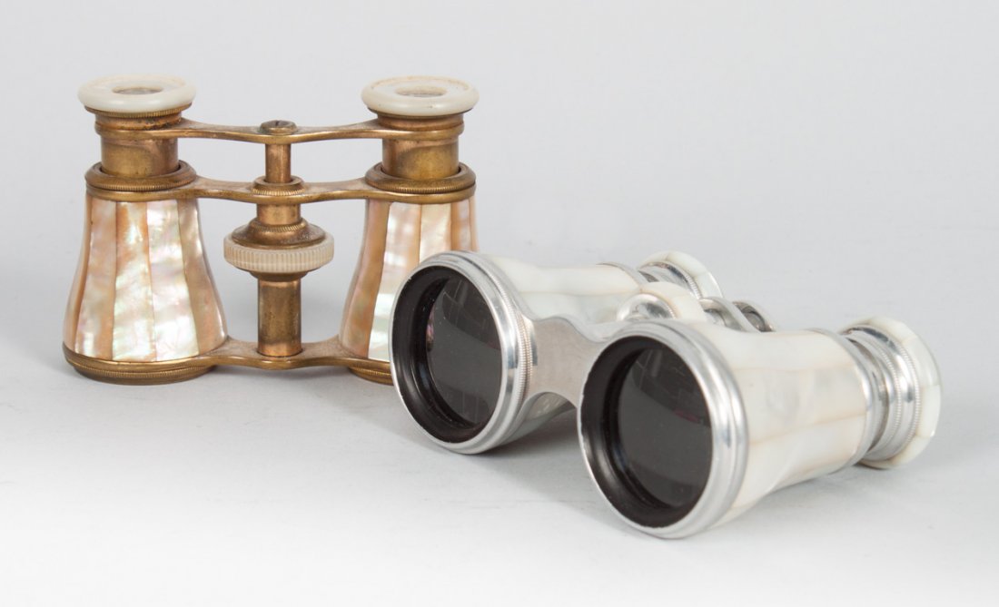 Two pair of French opera glasses: late 19th century; pair of silvered metal and mother-of-pearl glasses, marked "LeMaire Paris," retailed by Gall & Lembke, New York, and mother-of-pearl and brass pair, unmarked