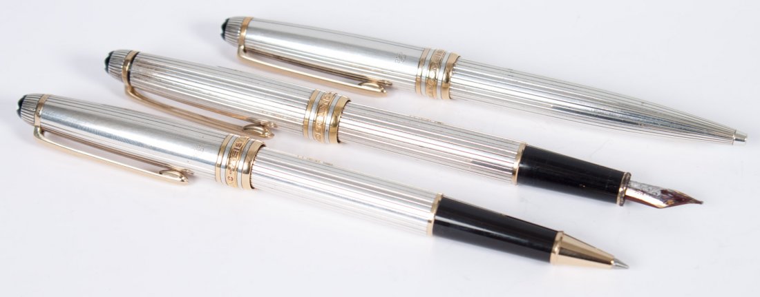 Three Montblanc No.146 "Godron" pens: two roller ball and one fountain, in sterling silver cases