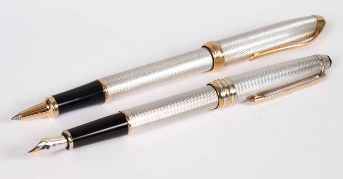 Montblanc Meisterstuck silver-cased pen: sterling silver fountain pen, and a similar silver Cross roller ball pen