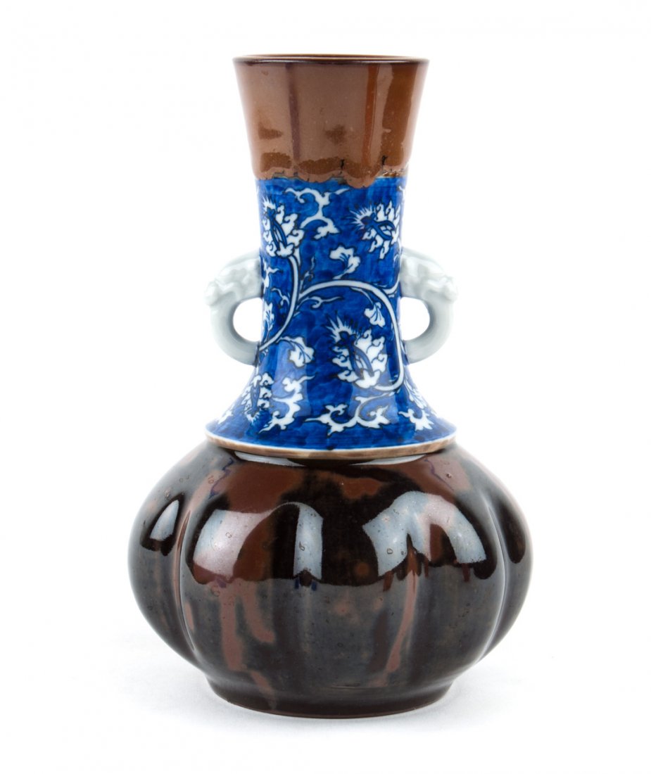Chinese porcelain vase: brown glazed base with blue and white vine decorated neck with a pair of dragon-form side handles, 8 1/2 in. H.