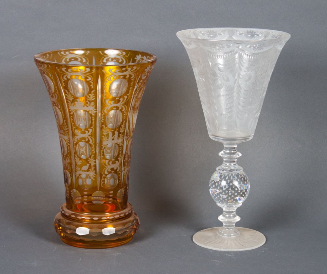 Pairpoint vase and Czecho-Bohemian vase: Pairpoint floral etched chalice-form glass vase, 12 in. H., and Czecho-Bohemian amber etched-to-clear trumpet-form vase with elk vignette, 10 1/2 in. H.