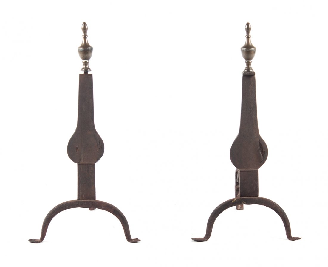Pair of Federal wrought iron and brass andirons: late 18th/early 19th century; brass urn tops, wrought iron vase-form bodies with penny seat, 21 in. H.