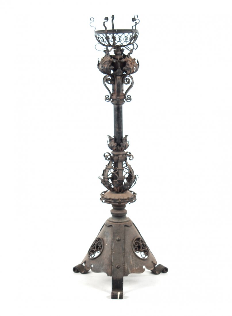 Edwardian wrought iron and metal plant stand: first quarter-20th century; wire and pierced metal bowl on triform riveted base, 46 in. H.
