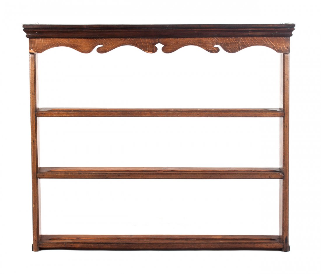 American vernacular hanging plate rack: 19th century; three shelves, lidded cornice, 41 in. H., 48 in. W.