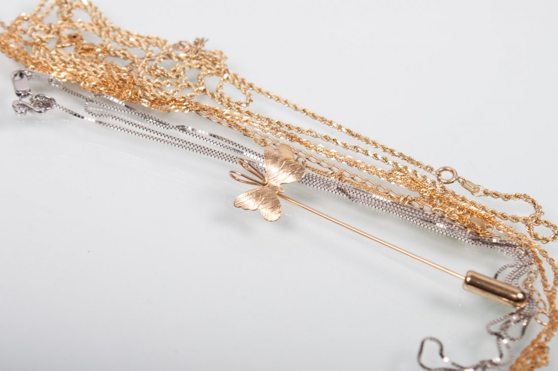 Six 14K gold jewelry items: including: 14K gold wheat chain, 24 in. L.; 14K white gold box chain, 24 in. L.; 14K gold rope chain, 24 in. L.; 2 anklets, one with hearts; and a butterfly stick pin; 9.5 grams t.w.