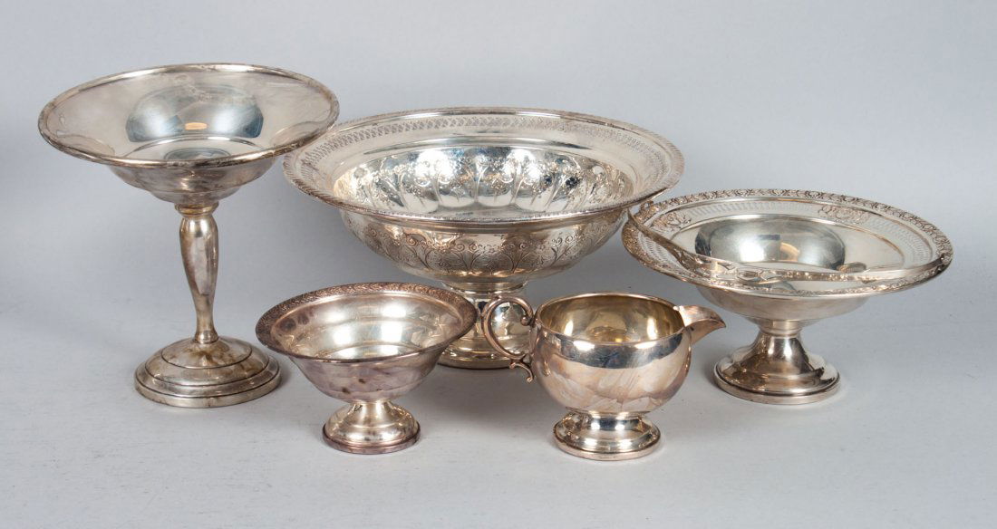 Five American weighted sterling table articles: including: Hamilton center bowl, 9 in. Diam.; Mueck-Cary "Royal Rose" basket, 7 in. H. over handle; compote, small pedestal bowl, and a cream pitcher
