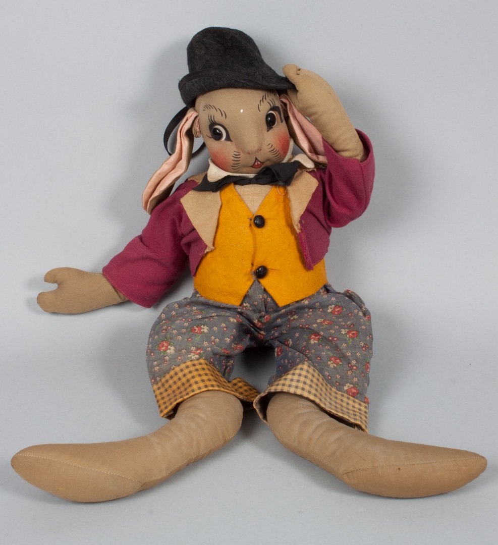 Cloth "Uncle Wiggly" doll: early 1940s; cloth body with painted face and button eyes, lopped ear rabbit dressed in smart Victorian suit with hat