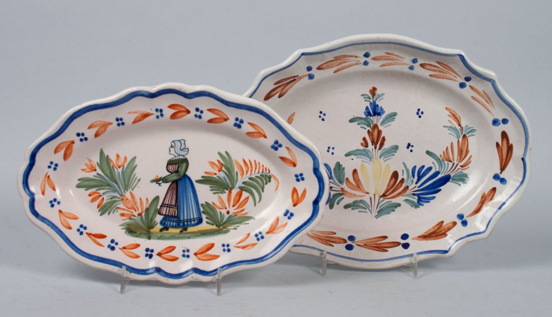 Two Quimper faience small platters: smaller platter with flower and figural decoration of woman in meadow, marked "HR Quimper," early 20th century, 10 1/2 in. L., 7 in. W., and larger platter with foliate decoration marked "HR," late 19