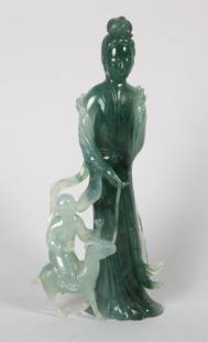 Chinese carved jade figural group: modeled as female figure with child riding goat, 7 1/2 in. H.