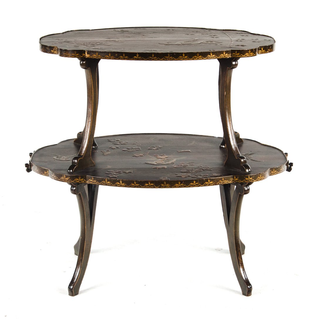 Edwardian chinoiserie serving table: early 20th century; two-tiered shaped table with bird and floral decoration, 31 in. H., 32 in. W., 23 in. D.