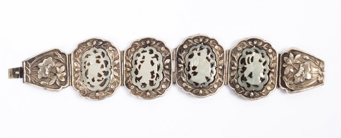 Chinese Mutton fat jade and white brass bracelet: circa 1900; 6 3/4 in. L., marked "China"