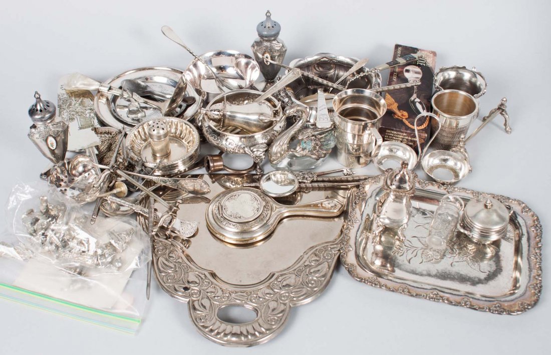 Group of small silver-plated & pewter items: including: nut dishes, salt cellars, condiment spoons, salt and pepper shakers, personal items, crumber, knife rests, pie server, thimbles, and a Chesapeake Pewter miniature collection