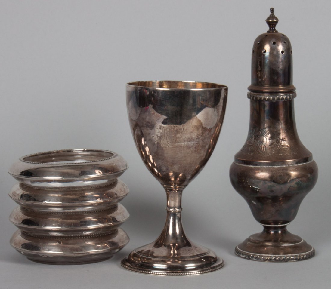 English sterling silver goblet: Walter Brind, London, 1783-84, 5 1/2 in. H.; together with 4 Frank Whiting sterling-mounted class coasters and an English silver-plated sugar caster; 5.81 ozt. of weighable silver