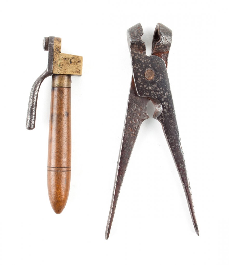 Firearm accessories: Starr and Hall bullet molds: comprising: one for a U.S. Starr contract .44 cal. revolver, wood and iron, 5 1/4 in. L.; the other for a Harper's Ferry Hall rifle musket, excavated at Harper's Ferry, 6 1/2 in. L.