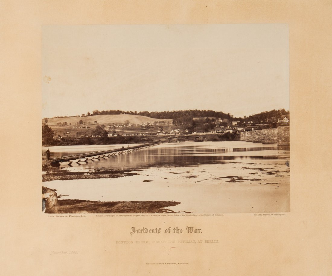 Photograph: Pontoon Bridge, Berlin, Md.: November, 1862, with credits of Alexander Gardner on the mount; vintage print, 6 3/4 X 9 in., mounted on album leaf with "Incidents of the War" imprint and with associated text leaf; framed
