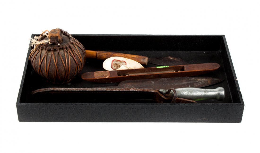 Group of edged weapons and other artifacts: Southern Philippines, late 19th century, including a wrought iron spear head or dagger, 12 1/4 in. L; an unidentified fish-tail blade fragment; a gourd vessel; and an instrument, possibly for counting