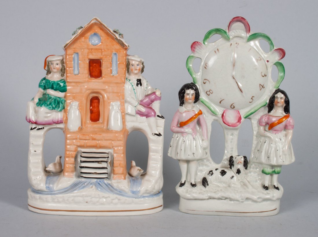 Two Staffordshire earthenware figure groups: second half-19th century; boy and girl at mill, 9 1/2 in. H., and two girls and clock, 9 1/2 in. H.