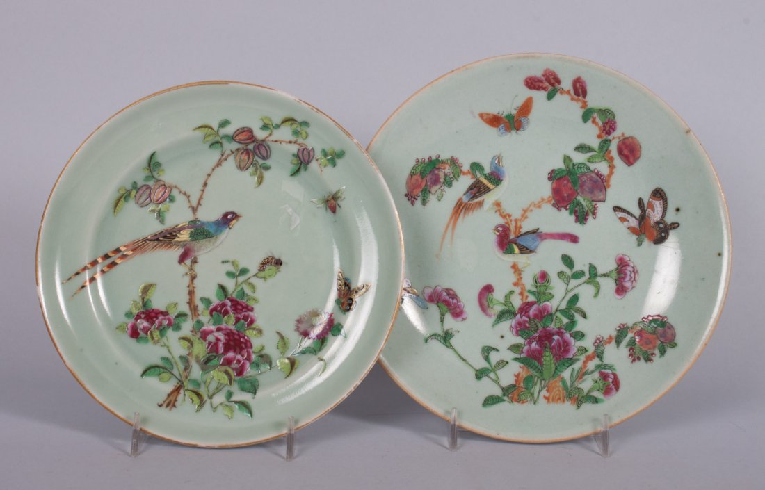 Two Chinese Export Famille Rose plates: mid-19th century; celadon ground with bird and floral decoration, one with underglaze blue mark, 8 and 8 1/2 in. Diam.