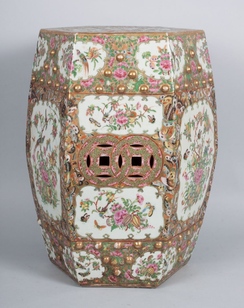 Chinese Export Rose Canton porcelain garden seat: second half-19th century; hexagonal form with bird, insect, and floral decoration, 18 in. H., 12 in. Diam.