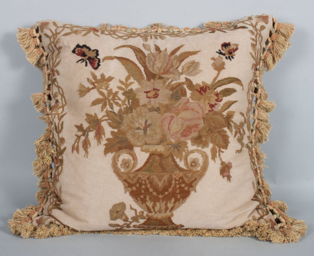 Needlepoint tapestry decorator throw pillow: with tassel trim and central image of urn with flowers, 20 in. Sq.