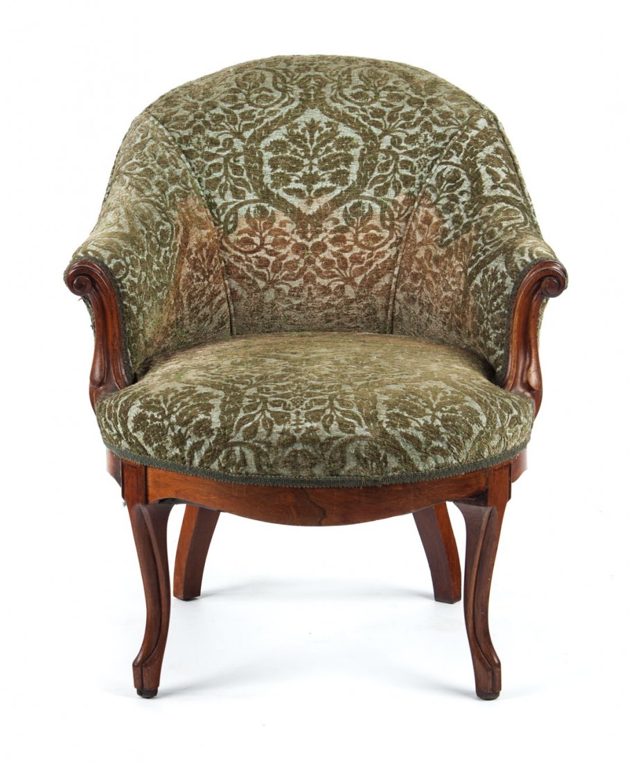 Rococo Revival rosewood upholstered slipper chair: mid-19th century;chenille upholstered back and seat over frame, exposed scroll carved arm supports and legs, 30 1/2 in. H., 30 in. W., 26 in. D.