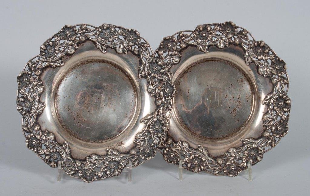 Pair of Redlich sterling silver bottle coasters: 13.77 ozt.