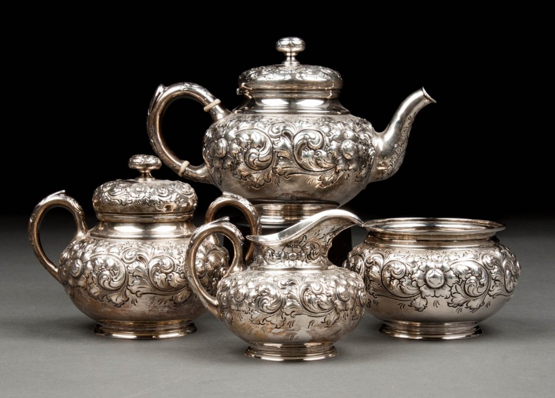 American repousse sterling 4-piece coffee set: Black, Starr & Frost, including: coffee pot (6 in. H.), covered sugar bowl, cream pitcher, and waste bowl, 49.98 ozt.