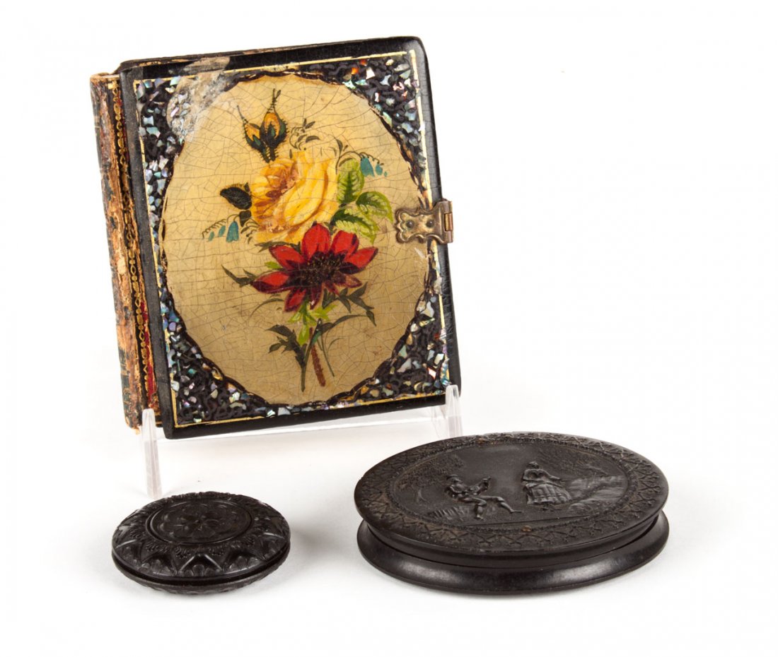 [Photography] Early portraits and cases: comprising: daguerreotype of a gentleman in a lacquered book-form case; ambrotype of a young woman in an oval thermoplastic case; and a fragmentary disk-shaped thermoplastic case