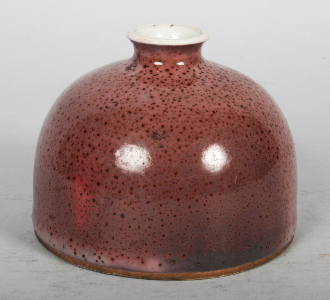 Chinese monochrome porcelain water pot: 19th century or earlier; beehive form with cinnamon glaze, and six character mark, 3 in. H. 3 3/4 in. Diam.