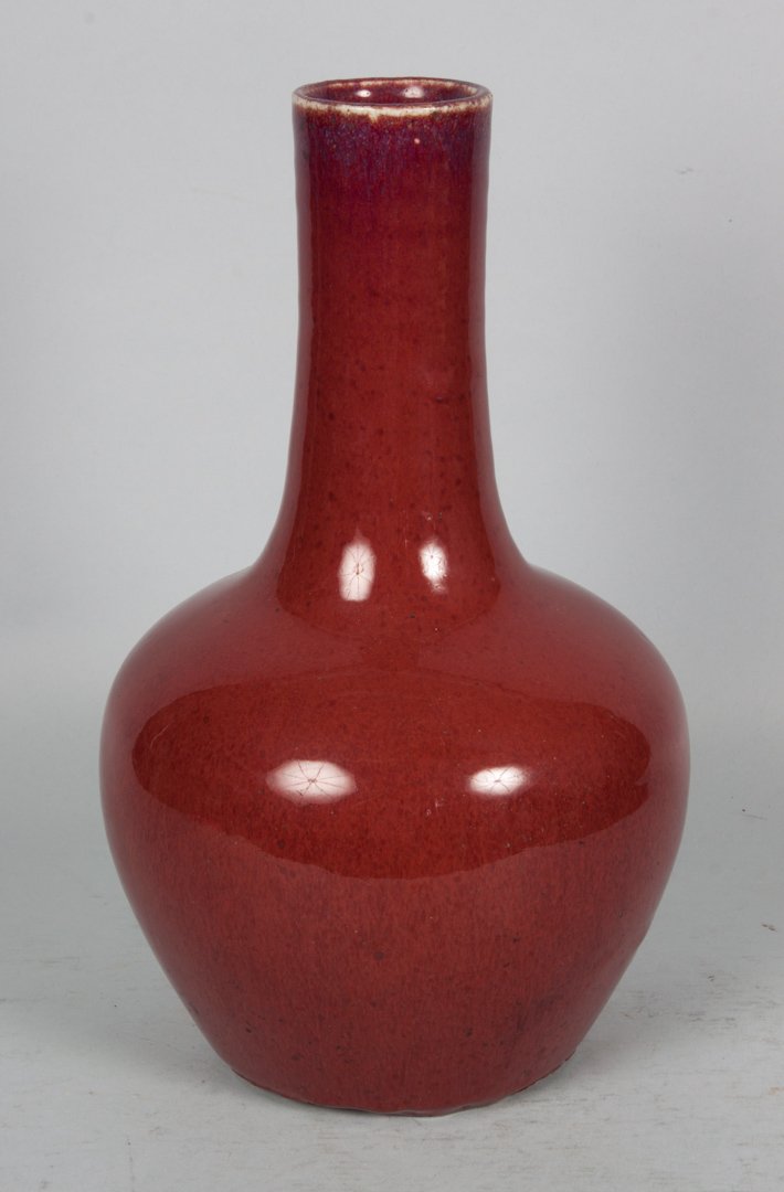 Chinese Sang du Boeuf porcelain vase: 19th century or earlier; ink character mark underneath, 12 in. H.