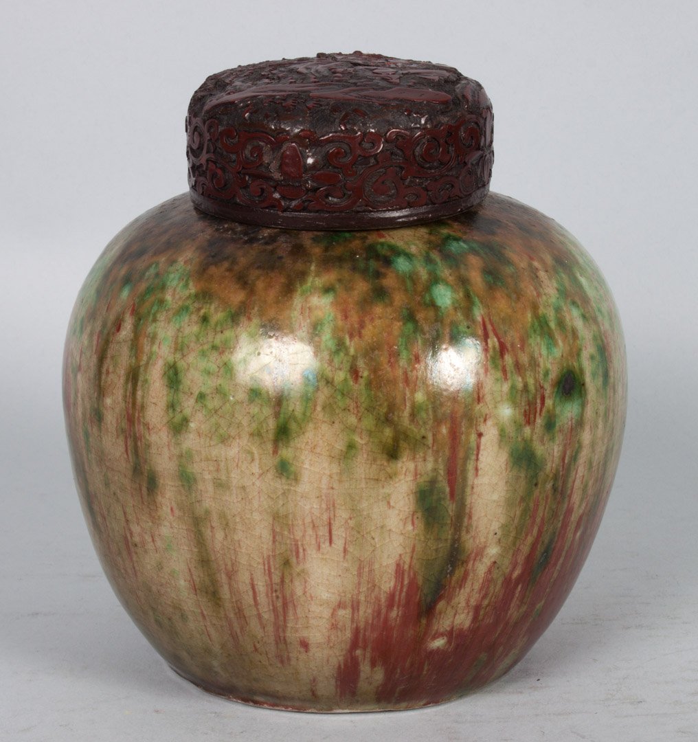Chinese overlay glaze porcelain ginger jar: 19th century; jar with Sang de Boeuf green and brown glazes, and mismatched cinnabar lacquer lid, possibly 18th century; 6 in. H.