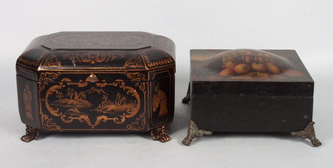 Two decorative boxes: Chinese Export style ebonized and gilt decorated jewelry box, and a French style print paper-covered valuables box, Chinese Box -6 in. H., 10 in. W.; French box - 5 in. H., 9 in. W.