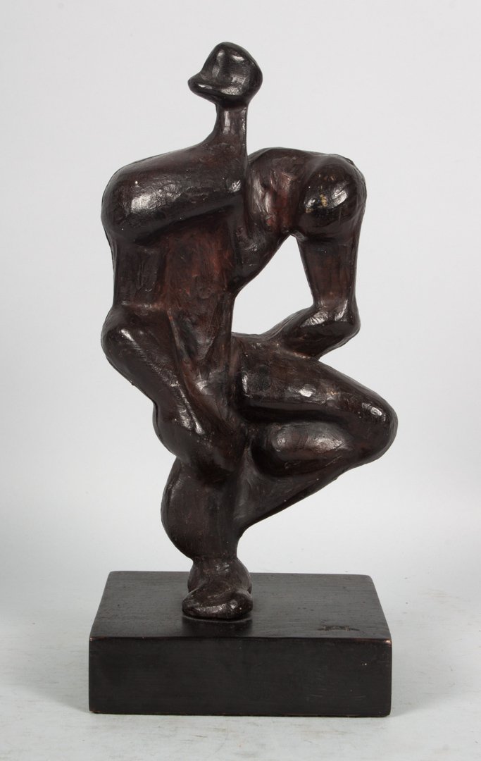 Modern abstract carved wood sculpture: carved and painted wood abstract male form, mounted on ebonized wood base, signed with monogram on base, 12 in. H. total