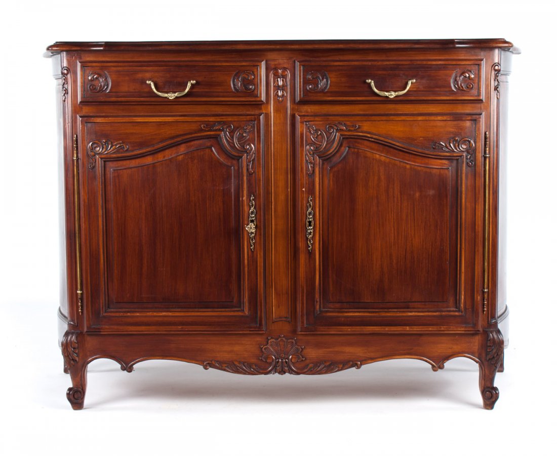 Louis XV style carved cherrywood buffet: parquetry inlaid top with molded edge, two drawers and compartment beneath enclosed by double solid panel doors, scroll feet, 40 1/2 in. H., 58 in. W., 29 in. D.
