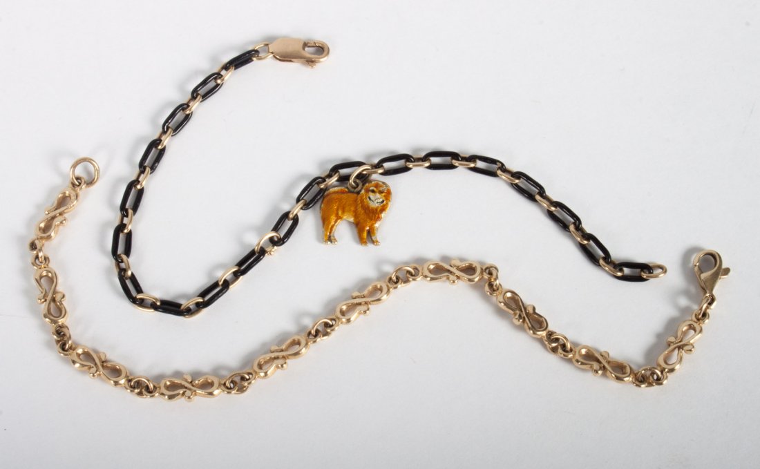Two 14K gold bracelets: 1) gold chain link bracelet, marked 14K, 7 1/2 in. L., 2) gold and black enamel bracelet with Chow Chow dog pendant, marked 14K, 7 1/2 in. L; 18.3 grams t.w.