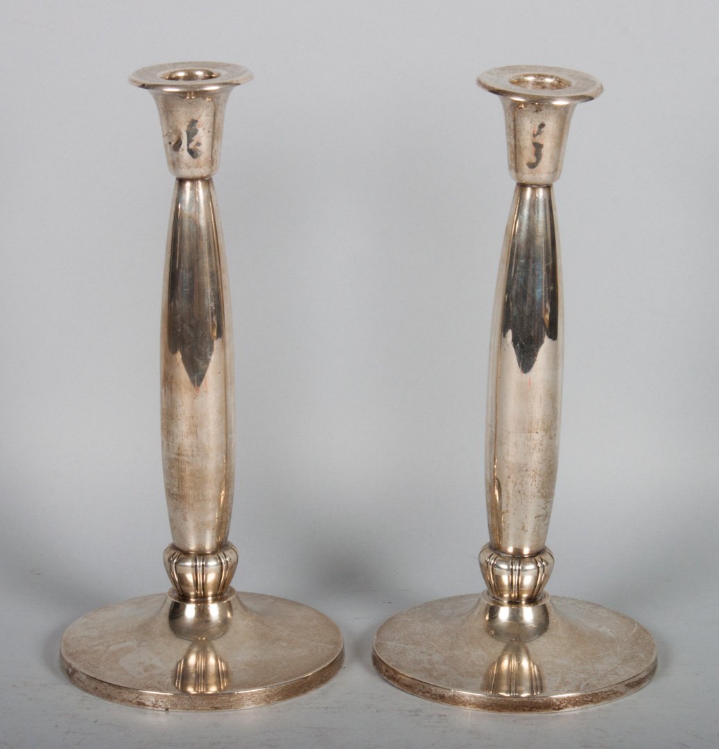 Pair of Reed & Barton sterling silver candlesticks: tall weighted sterling silver candlesticks, 10 in. H.