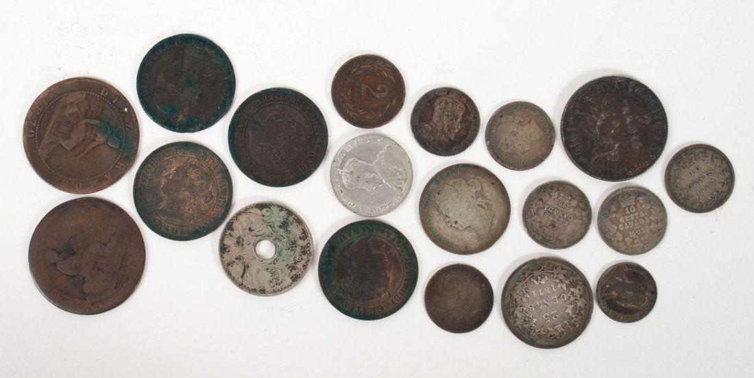 Assorted Canadian and other foreign coins: 1861 - 1942, comprising 16 items, including: 11 from Canada (notably a silver quarter, 1874, 5 silver dimes, and a silver 5-cent piece, 1910); and a French silver 2-francs, 1919