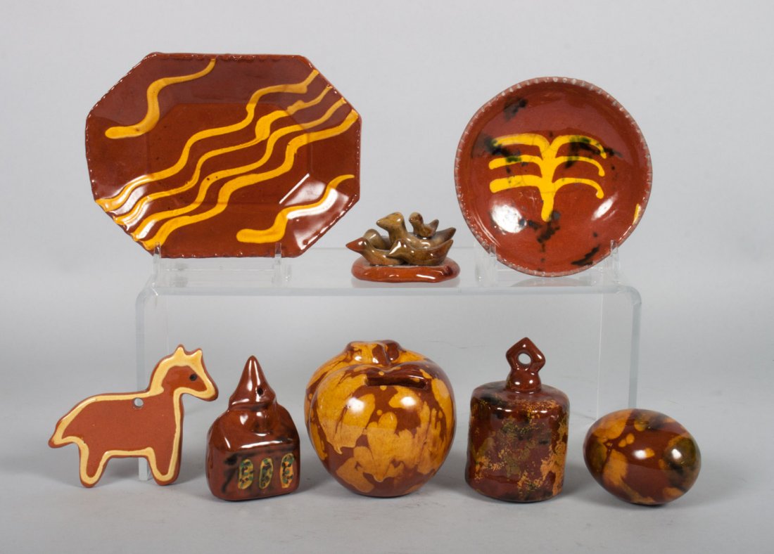 Large assortment of contemporary redware items: circa 1970's; 29 items, including: bird groups, Christmas ornaments, and miniature dishes, with yellow slip-glaze decoration, many signed and dated